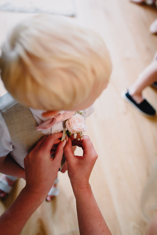 Buttonholes look great when they match your bridesmaid dresses